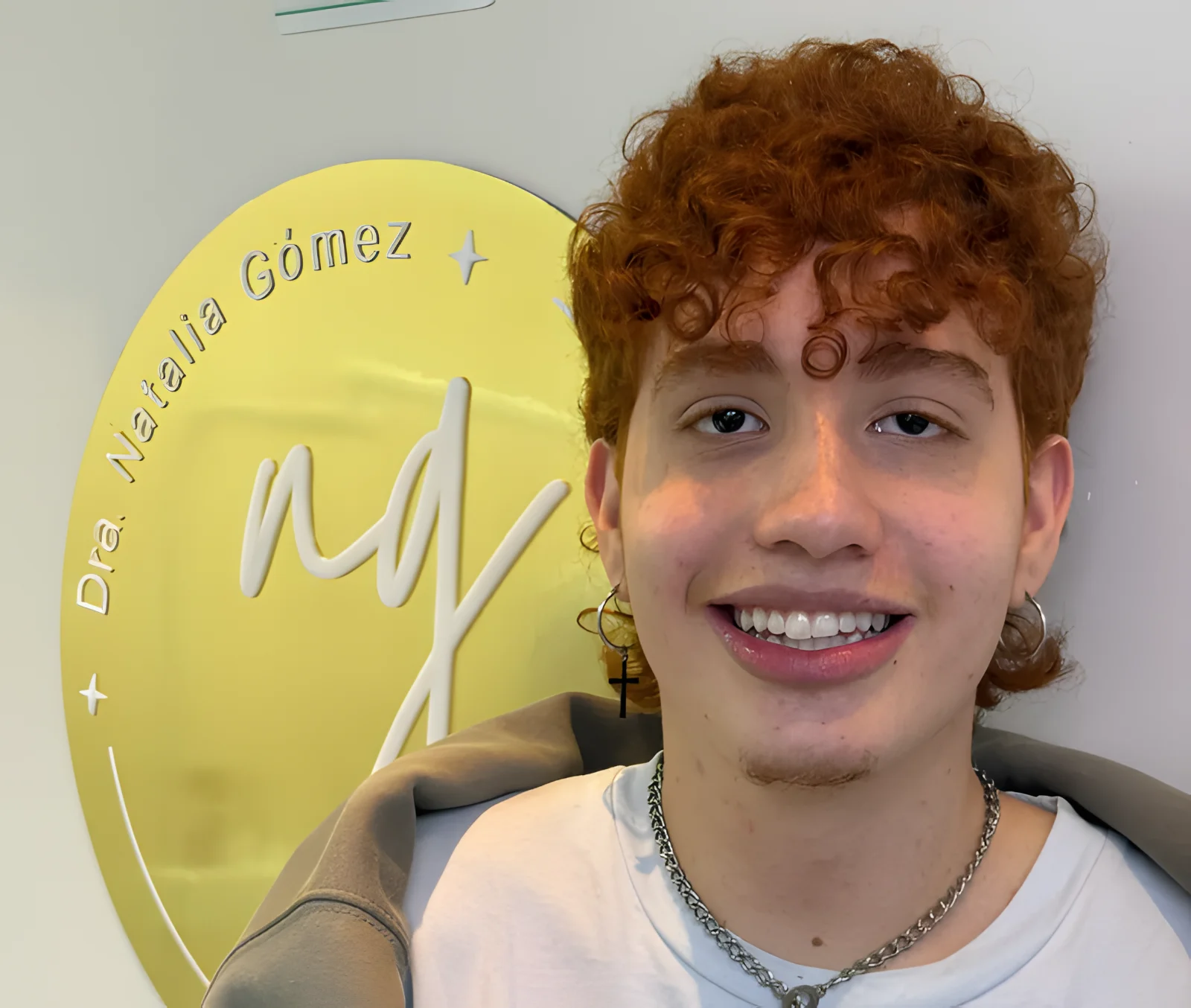 Young patient smiling at the clinic